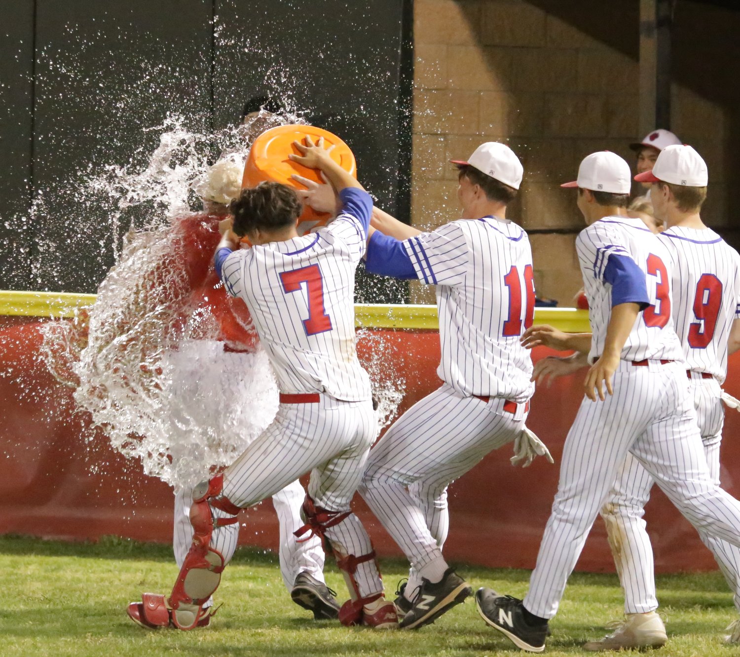 Alba-Golden baseball Coach Jimmy Oxford disappeared in a wall of Gatorade in the post-game celebration as the Panthers won their first district championship Friday.